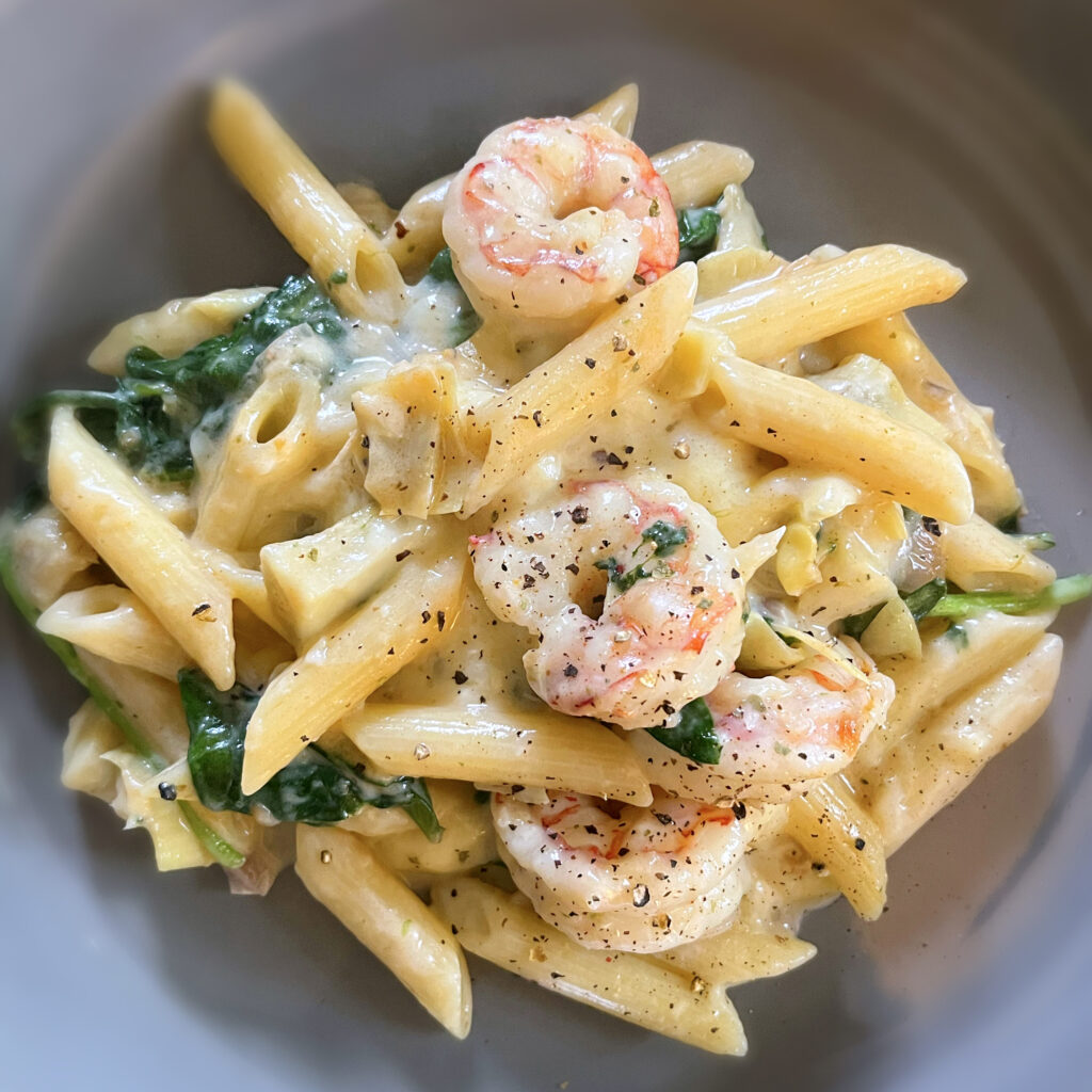 Argentinian Shrimp Penne with Brie Cream Sauce, Artichoke Hearts, and Spinach