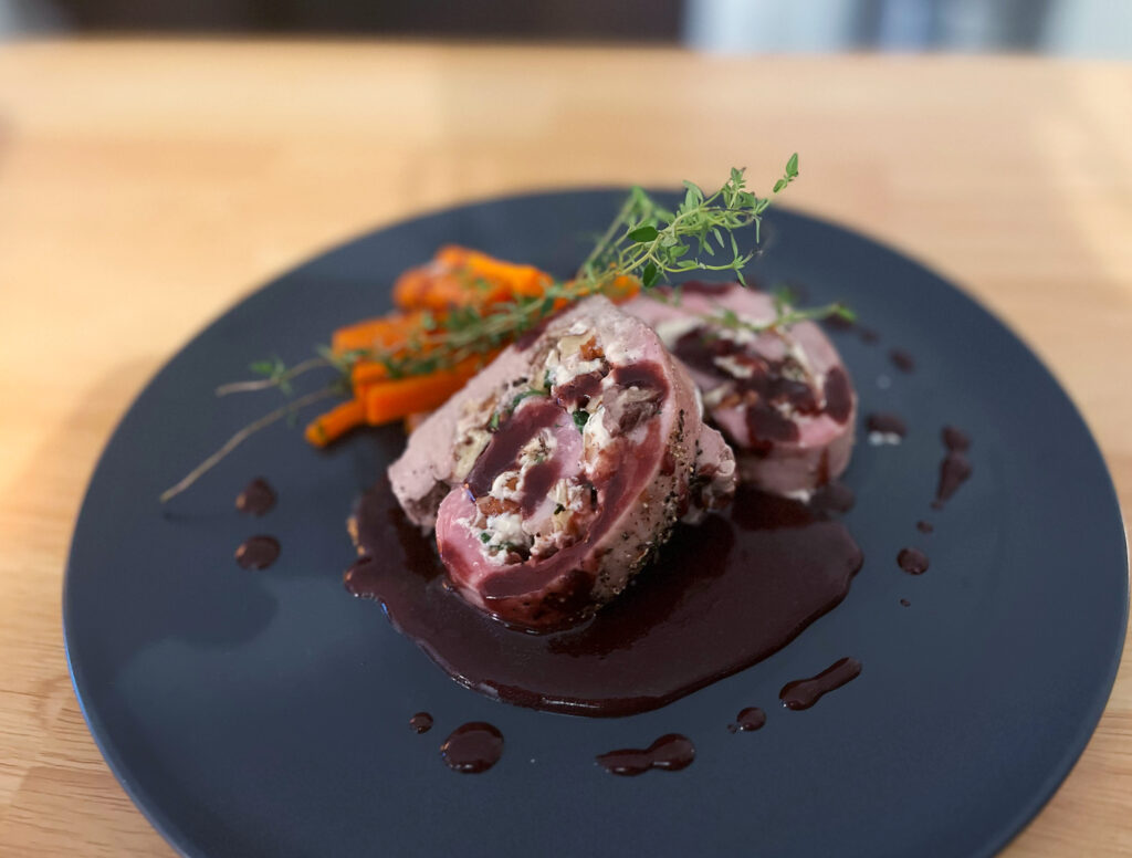 Pecan, Cream Cheese, Nutmeg Stuffed Pork Loin with a Cherry, Cabernet, Maple Reduction